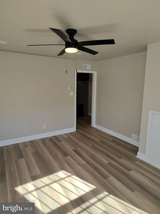 unfurnished room featuring wood-type flooring and ceiling fan