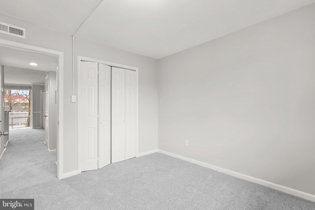 574 Wilson Bridge Dr Unit D-2, Oxon Hill, MD 20745 - unfurnished bedroom with light carpet and a closet