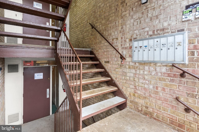 574 Wilson Bridge Dr Unit D-2, Oxon Hill, MD 20745 - stairs with mail boxes and brick wall