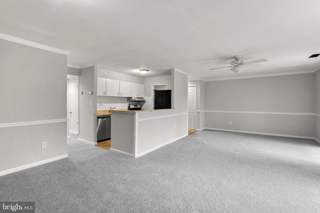 574 Wilson Bridge Dr Unit D-2, Oxon Hill, MD 20745 - kitchen with black fridge, crown molding, dishwasher, kitchen peninsula, and white cabinets