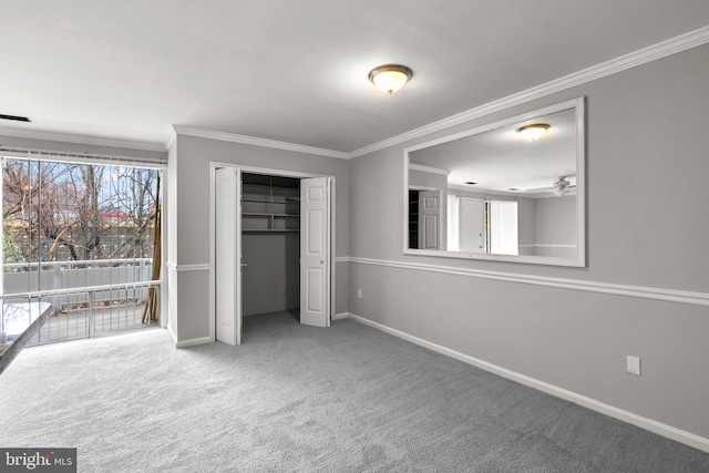 574 Wilson Bridge Dr Unit D-2, Oxon Hill, MD 20745 - unfurnished bedroom featuring ornamental molding, carpet floors, and a closet