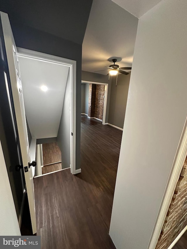 hall with dark hardwood / wood-style floors