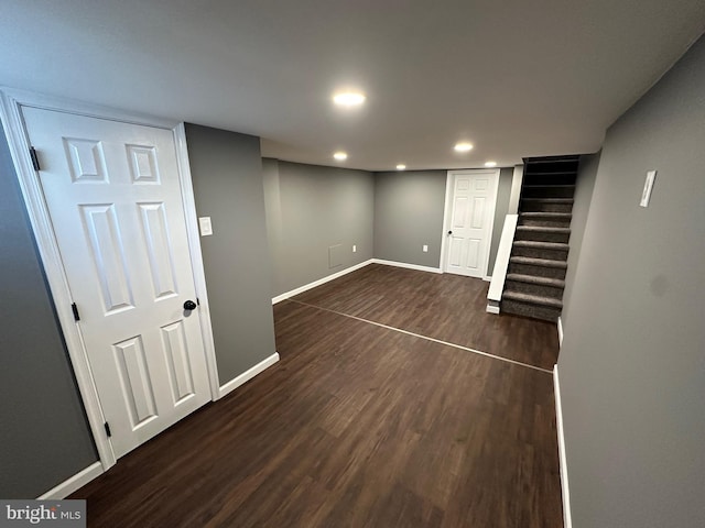 basement with dark wood-type flooring