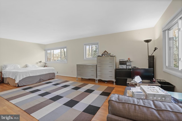 bedroom featuring wood finished floors