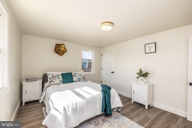 bedroom featuring wood-type flooring