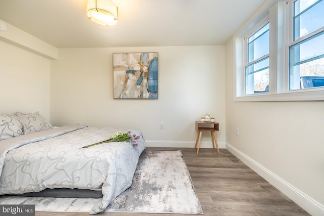 bedroom featuring hardwood / wood-style flooring