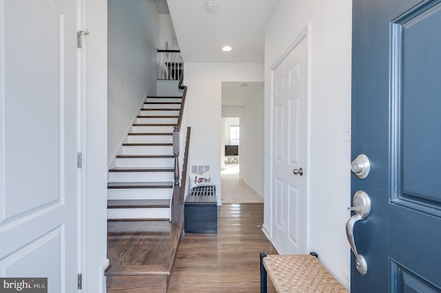 foyer entrance featuring dark hardwood / wood-style flooring