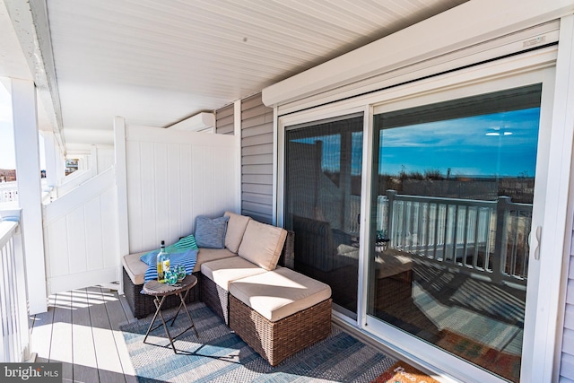 balcony featuring a wall mounted air conditioner