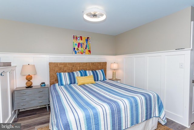 bedroom with wood-type flooring