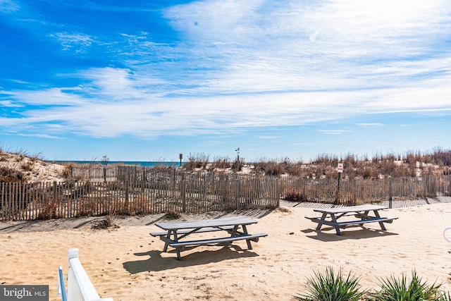 surrounding community featuring a water view