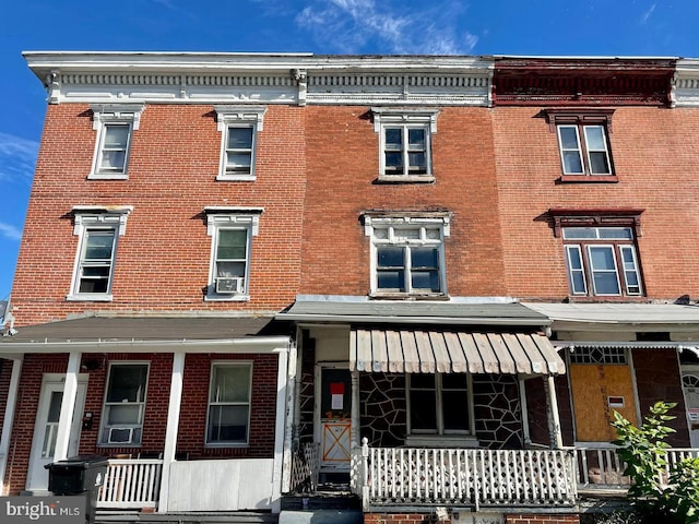 view of front of home featuring cooling unit