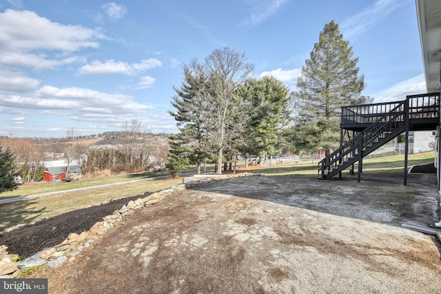 view of yard with a deck