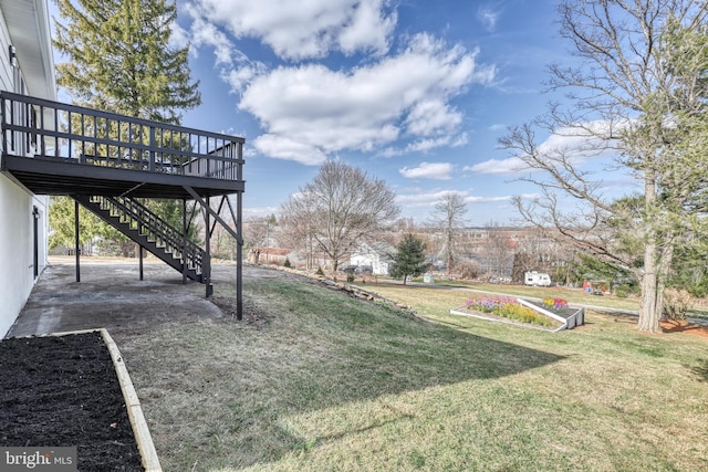 view of yard with a deck