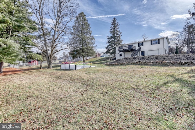 view of yard featuring a pool side deck