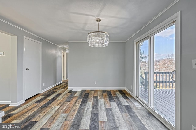 unfurnished dining area featuring crown molding, a chandelier, and dark hardwood / wood-style flooring