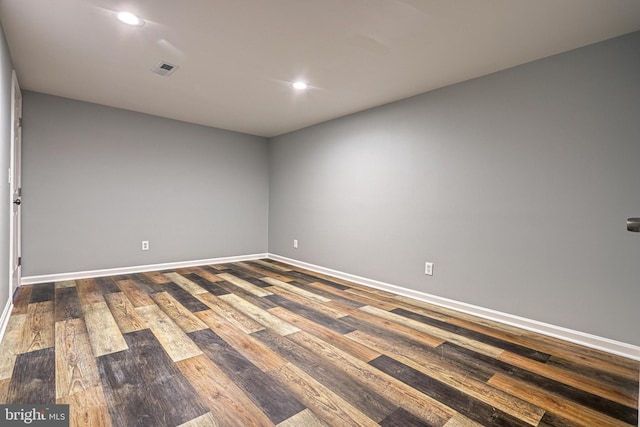 empty room featuring hardwood / wood-style flooring