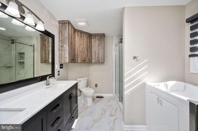 bathroom featuring vanity, toilet, and walk in shower