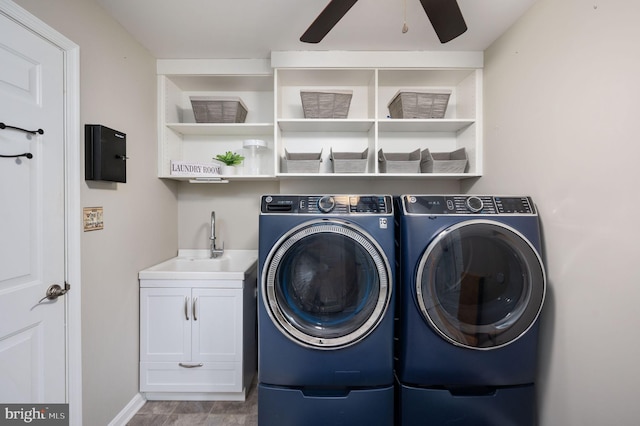 laundry room featuring sink, cabinets, independent washer and dryer, and ceiling fan