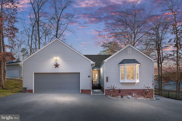 view of front of home featuring a garage