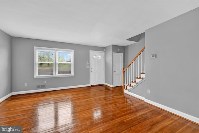 foyer featuring wood-type flooring