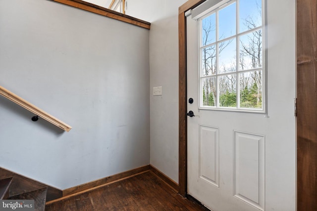 doorway with dark hardwood / wood-style flooring