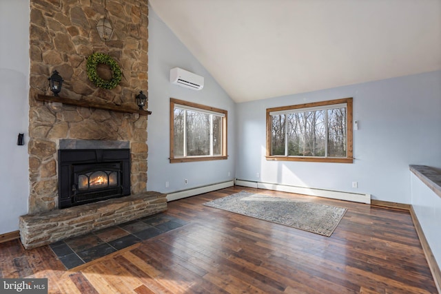 unfurnished living room with dark hardwood / wood-style flooring, a wall mounted air conditioner, a fireplace, and a baseboard heating unit