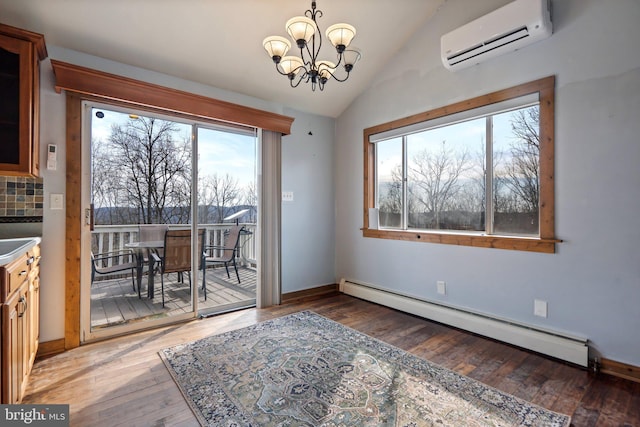 dining area with vaulted ceiling, an inviting chandelier, baseboard heating, dark wood-type flooring, and a wall unit AC