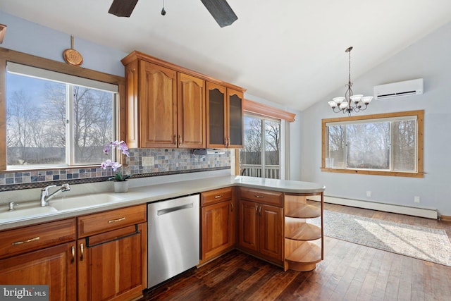 kitchen with lofted ceiling, sink, a wall mounted air conditioner, stainless steel dishwasher, and a baseboard radiator