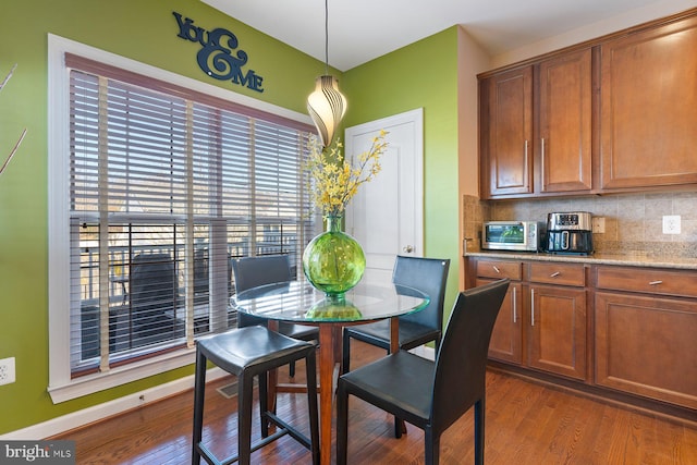 dining room featuring dark hardwood / wood-style floors