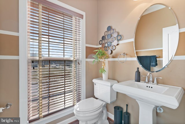 bathroom with toilet and sink