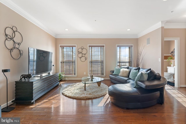 living room with crown molding and dark hardwood / wood-style floors