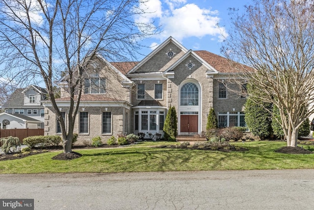 view of front facade with a front lawn