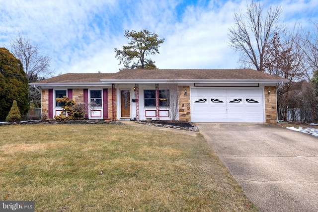 ranch-style home with a front lawn and a garage