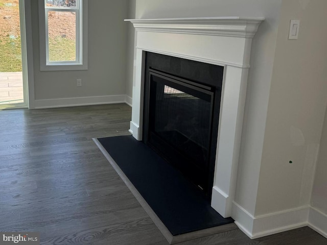 551 Trifecta Rd Unit 323, Downingtown, PA 19335 - detailed view of wood finished floors, a fireplace, and baseboards