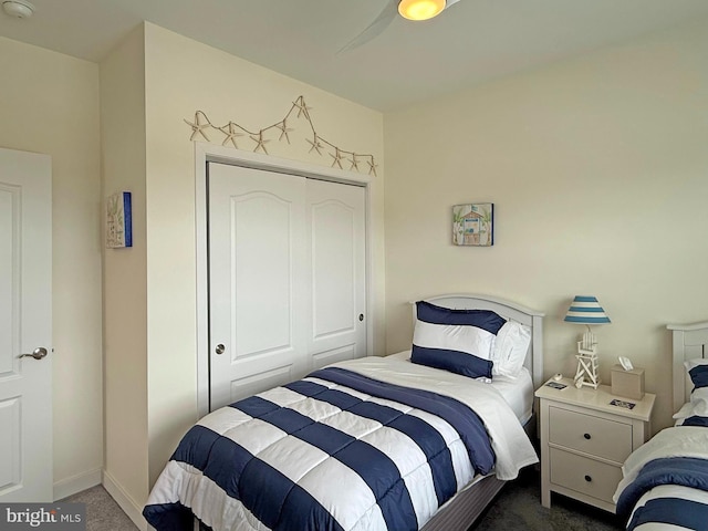 carpeted bedroom with a closet