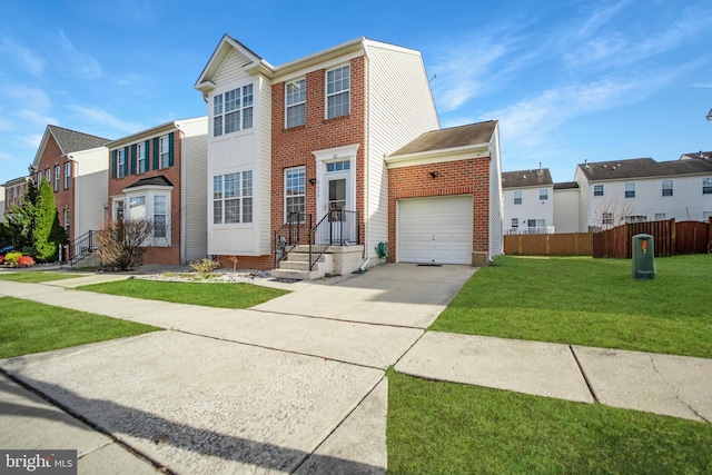 view of front of home with a garage and a front lawn