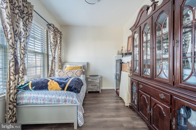 bedroom featuring dark hardwood / wood-style floors