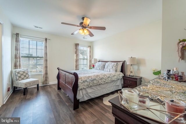 bedroom featuring ceiling fan and dark hardwood / wood-style flooring