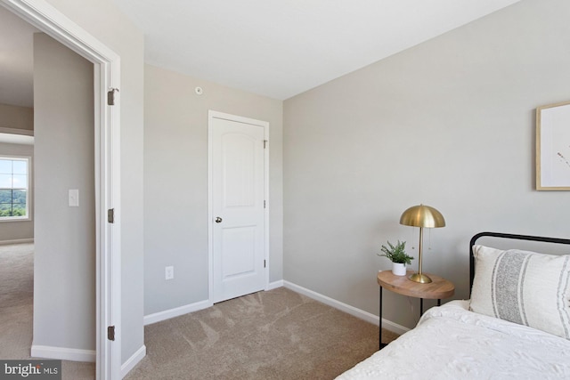 unfurnished bedroom with carpet flooring