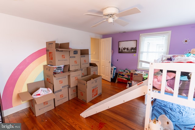 bedroom with hardwood / wood-style flooring