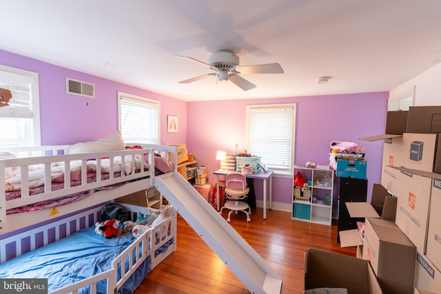 bedroom featuring wood-type flooring and ceiling fan