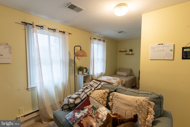 bedroom with a baseboard radiator