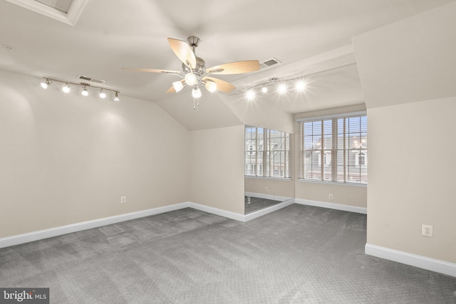 additional living space with lofted ceiling, carpet floors, and ceiling fan