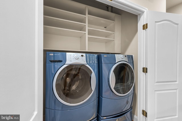 laundry room featuring washer and dryer