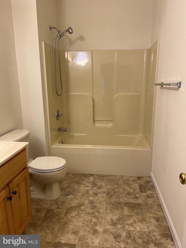 full bathroom featuring vanity, shower / washtub combination, and toilet