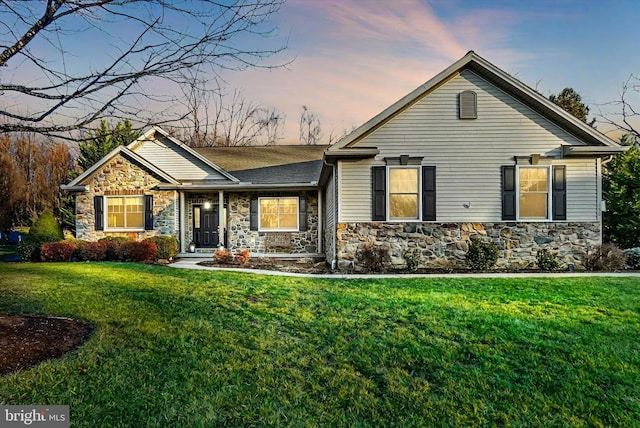 view of front of house with a lawn