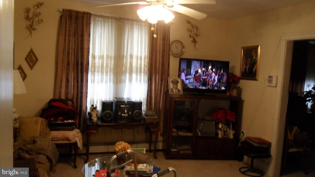 living room featuring ceiling fan