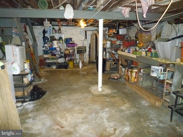 basement featuring gas water heater