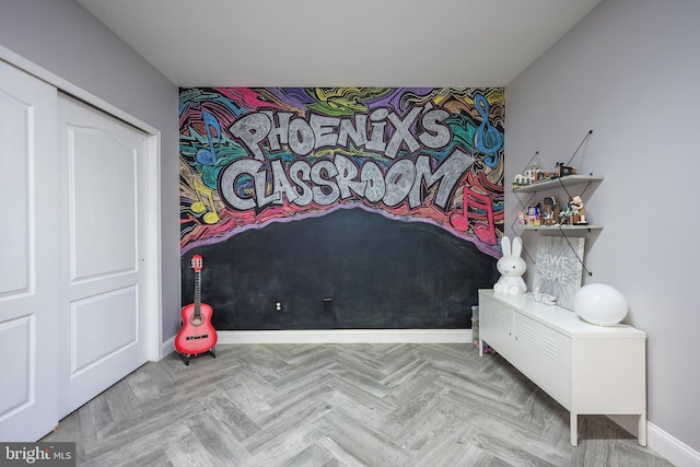 bedroom with parquet flooring