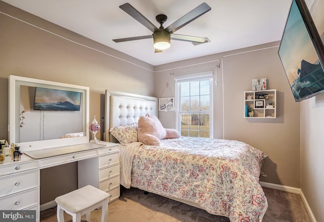 carpeted bedroom featuring ceiling fan